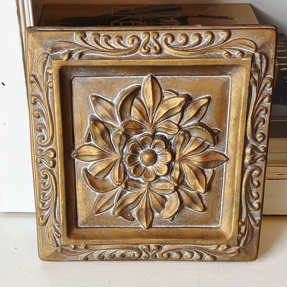 Ornate Carved Floral Wall Plaque in Metallic Gold
